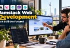 Developers reviewing a fast Jamstack website on a large monitor.