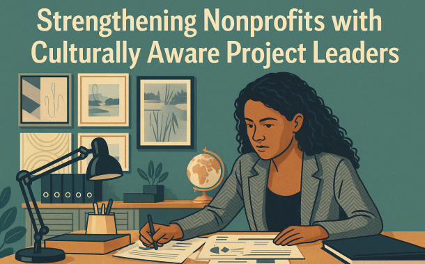 Focused nonprofit leader working on community-based project plans in a culturally informed office setting