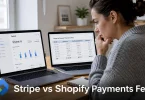 A Shopify store owner compares payment processing costs across two laptop screens while working out her Stripe vs Shopify Payments fees.