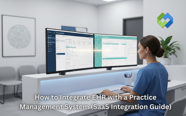 Healthcare admin at clinic workstation with EHR and practice management system synced on dual monitors